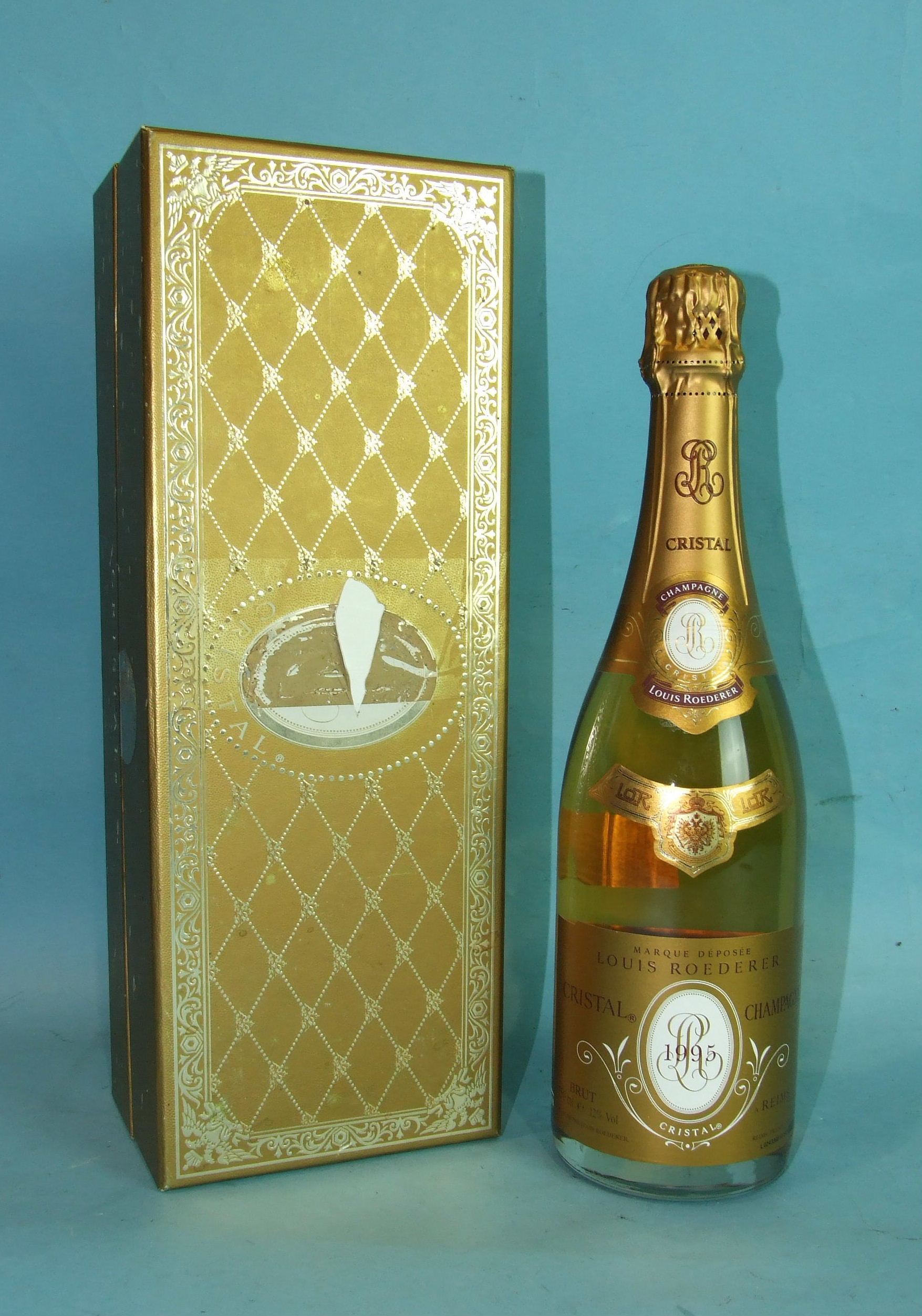 Louis Roederer Cristal Champagne 1995, 750ml, 12%, in cardboard box.