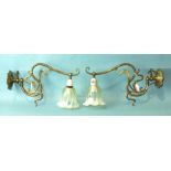 A pair of Art Nouveau-style lacquered brass gas wall light fittings with Vaseline glass shades, (