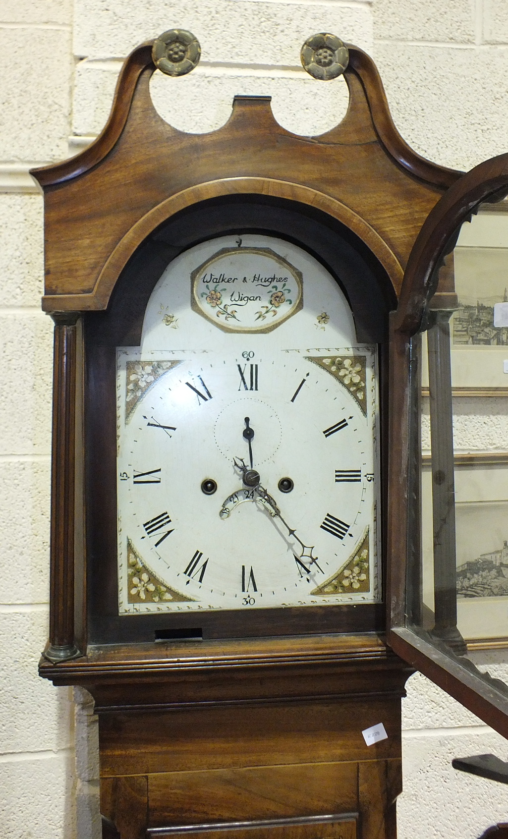 A 19th century mahogany long case clock, the arch painted dial with second subsidiary and calendar