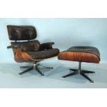 Charles & Ray Eames, a lounge chair with button leather pads and arms, (two-screw fixing), with