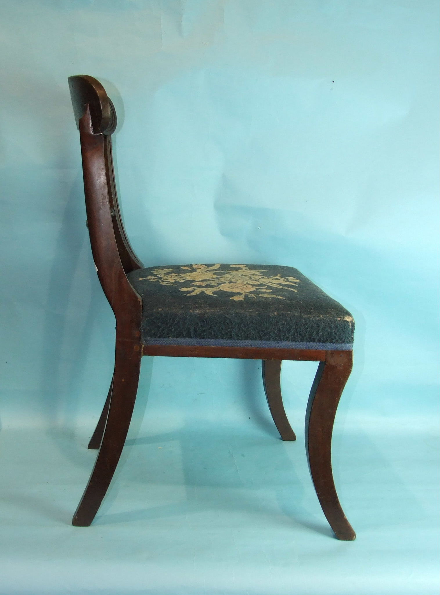 A set of six George IV mahogany sabre-legged dining chairs, each with carved top rail, centre bar - Image 2 of 2