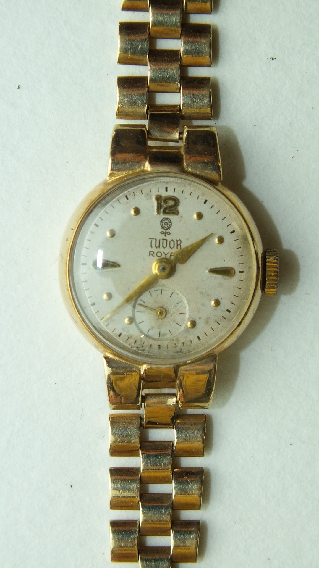 Tudor Royal, a ladies 9ct gold wrist watch, the circular dial with '12', dart and dot markers and