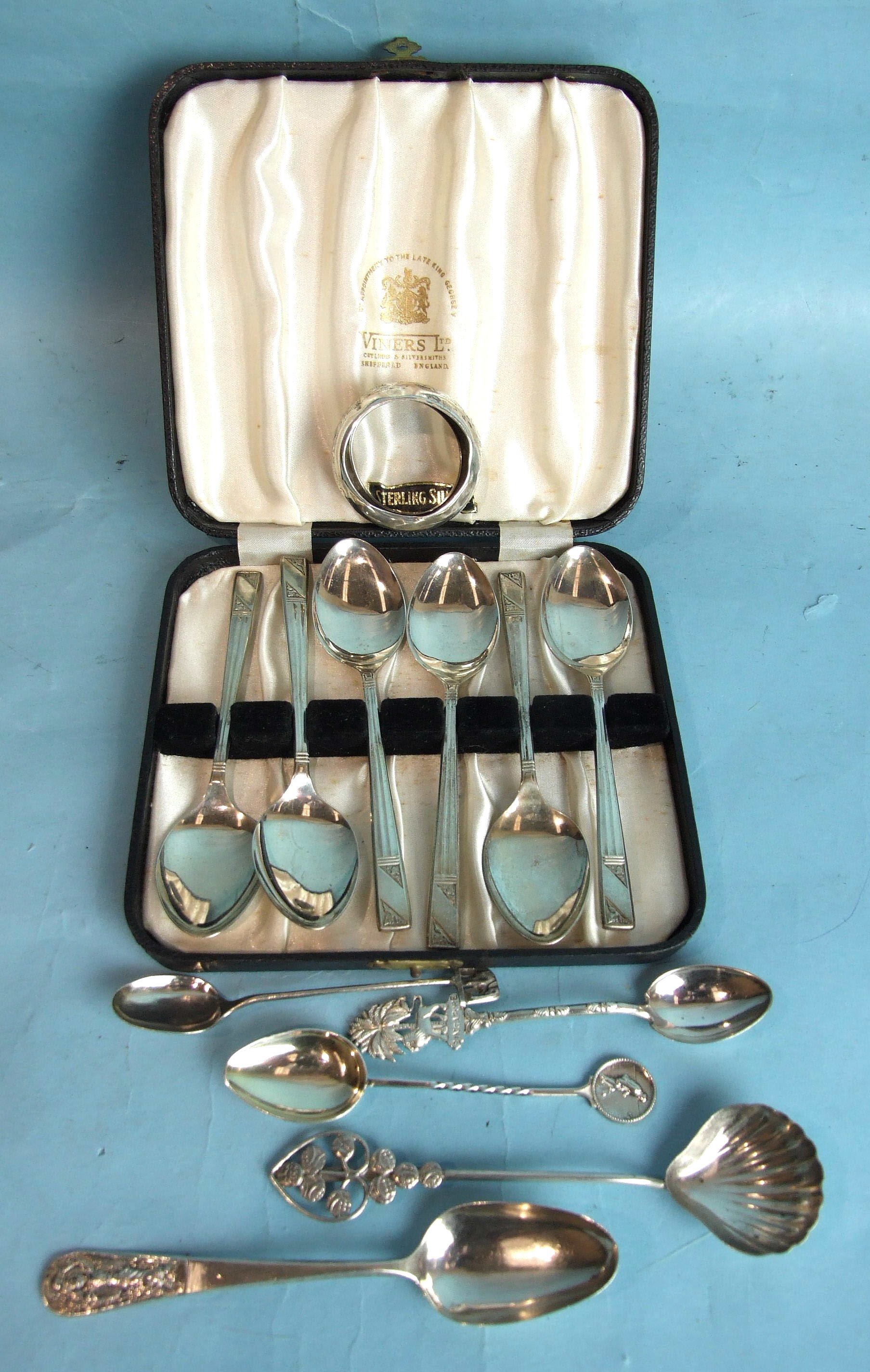 A cased set of six silver teaspoons, Sheffield 1959, a silver napkin ring and other white metal