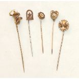 Five various Victorian and Edwardian stick pins, (5).