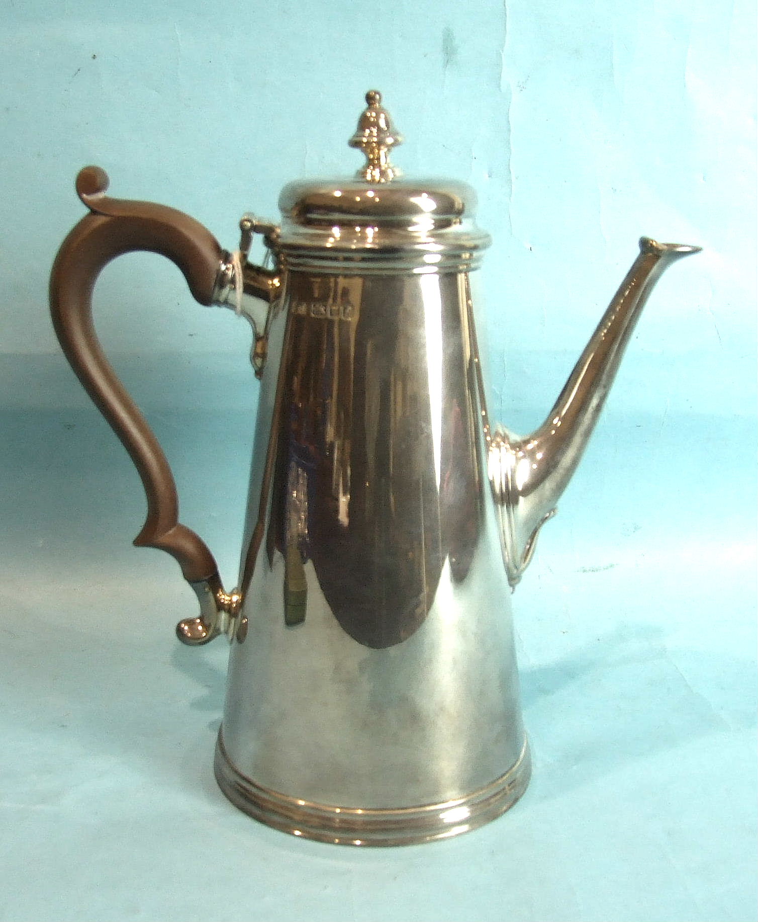 A modern silver coffee pot of plain tapered form, 26cm high, London 1961, ___29oz.