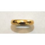 A 22ct gold wedding band, size L, 6.9g.