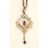 A garnet and pearl-set open-work pendant, (a/f), on belcher-link chain, unmarked, 9.1g.