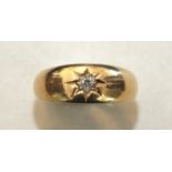 An 18ct gold gipsy ring set single old brilliant-cut diamond, size O½, 4.9g.