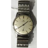 Omega, a gent's wrist watch c1962, the silvered dial with baton numerals and seconds subsidiary, the