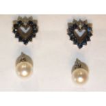 A pair of 9ct gold heart-shaped ear studs, each set eleven small round-cut sapphires and a diamond