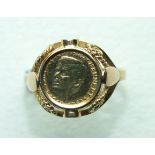 A gold ring set a John F Kennedy commemorative coin, size L, 2.5g.