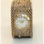 Jaeger LeCoultre, a ladies 9ct gold wrist watch, the circular dial with Arabic and dart numerals set