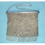 A silver chain mail mesh purse with tassel decoration, London import marks, 19 x 17cm, ___9½oz.