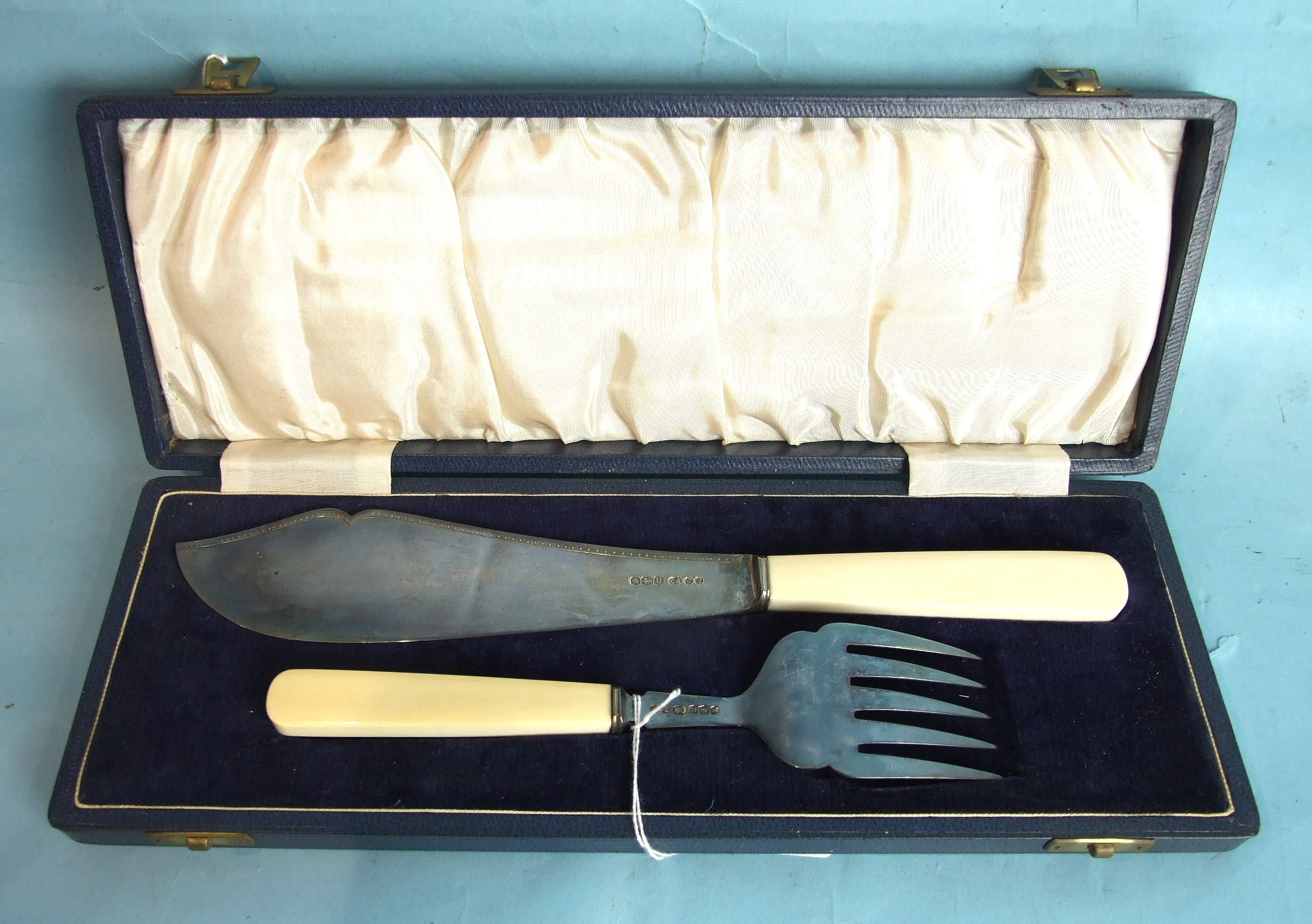 A pair of cased fish servers with ivory handles, Sheffield 1937, maker GB & S.