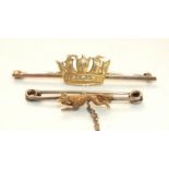 A small hunting brooch with a running fox, unmarked, 3.8cm long and a Naval crown sweetheart brooch,