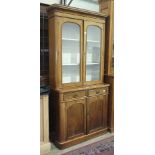 A Victorian mahogany glazed bookcase, the cornice above a pair of glazed doors, a single drawer
