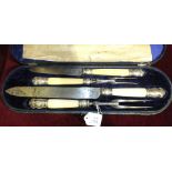 A Late-Victorian four-piece silver-mounted and ivory-handled carving set by Joseph Rodgers & Sons,