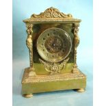 A 19th century French brass mantel clock of caryatid architectural form, with French gong-striking