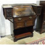 An Art-Nouveau-style mahogany writing bureau, the fall front above a drawer and two small cupboard