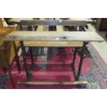 *A late-19th century double school desk with elm back rail, seat, foot rail and sloping desk top