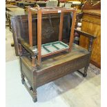 A 20th century oak monk's bench, 98cm wide and a stick stand, (2).