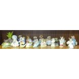 A collection of sixteen Beswick Beatrix Potter figures, including 'Poorly Peter Rabbit', 'Tom Kitten