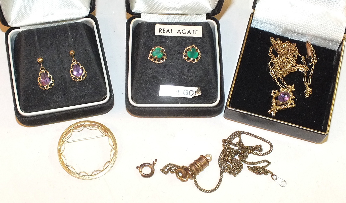 A 9ct gold pendant set amethyst, on chain, a pair of similar earrings and other items of jewellery.