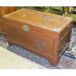 A 20th century camphor-lined blanket chest with carved bamboo decoration on lid and front, 102cm