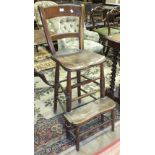 *A vintage elm and beech schoolroom high chair, with plain curved rails and moulded seat, on