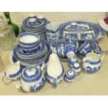 Approximately sixty-five pieces of Alfred Meakin blue and white 'Old Willow' pattern dinner and