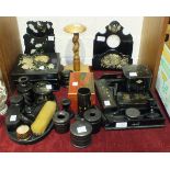 A collection of floral-decorated black-lacquered boxes, and others, ebony dressing table items and