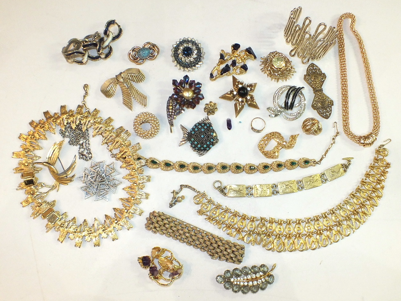 A Trifari brooch of bow form and a quantity of costume jewellery.