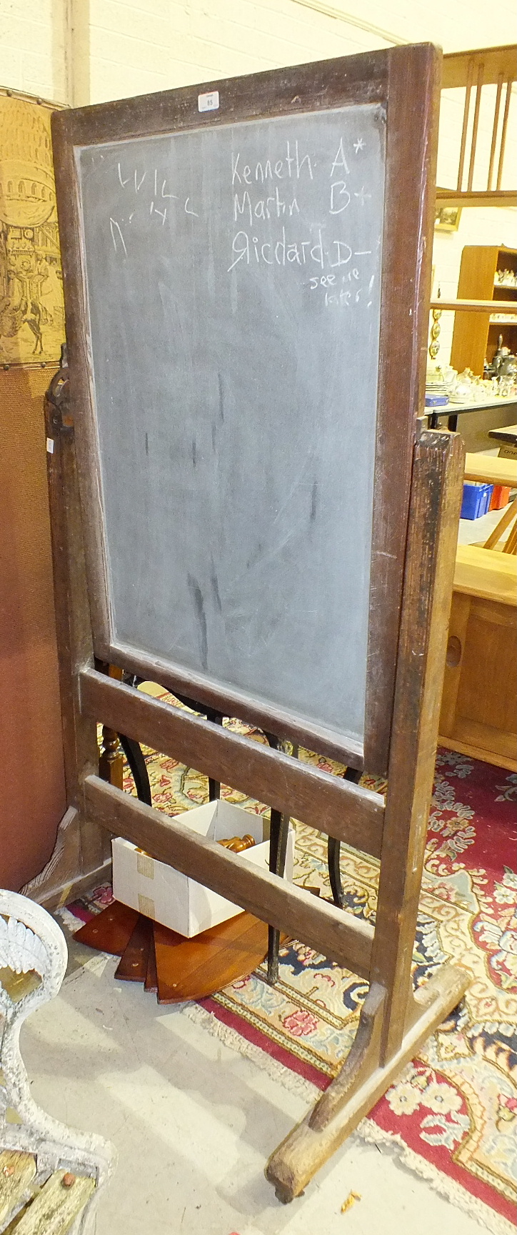 *A Victorian pitch pine schoolroom blackboard of rectangular shape, the rectangular board on cast