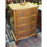 A reproduction mahogany serpentine chest of four drawers, 48cm wide.