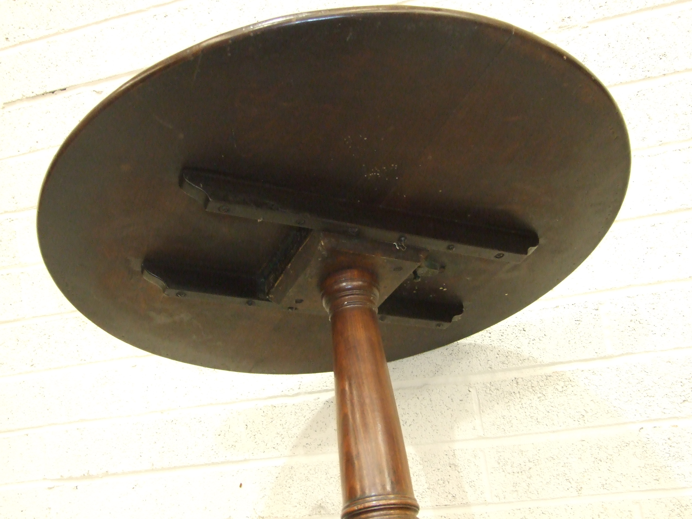 A Georgian mahogany circular tilt-top occasional table with plain stem and tripod support, on pad - Image 2 of 3