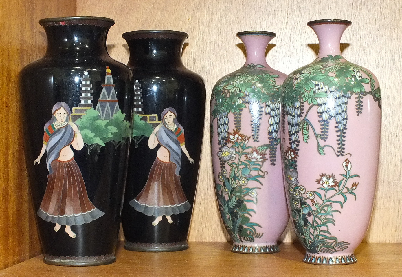 A pair of 20th century cloisonné vases decorated with flora and foliage, on a pink ground, 15cm