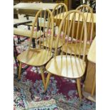 A set of four Ercol light elm stick-back chairs and a drop-leaf table, (5).