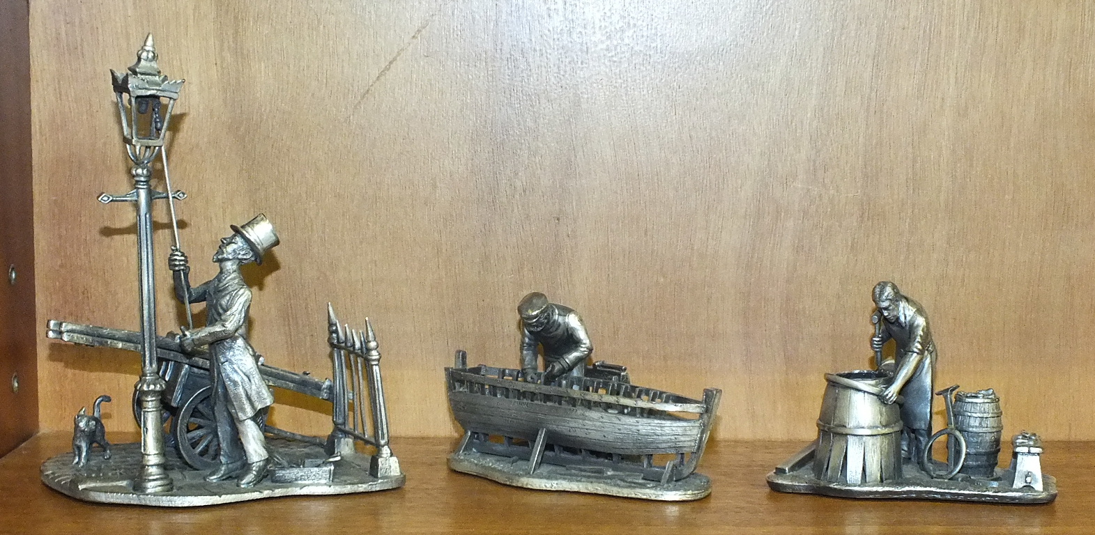 Three Evergreen Collection pewter figures, including Lamp lighter, Boat builder and Cooper, (3).
