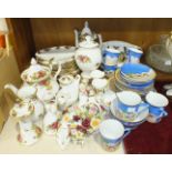 A collection of Royal Albert 'Old Country Roses' tea and dinner ware, flower-encrusted ornaments,