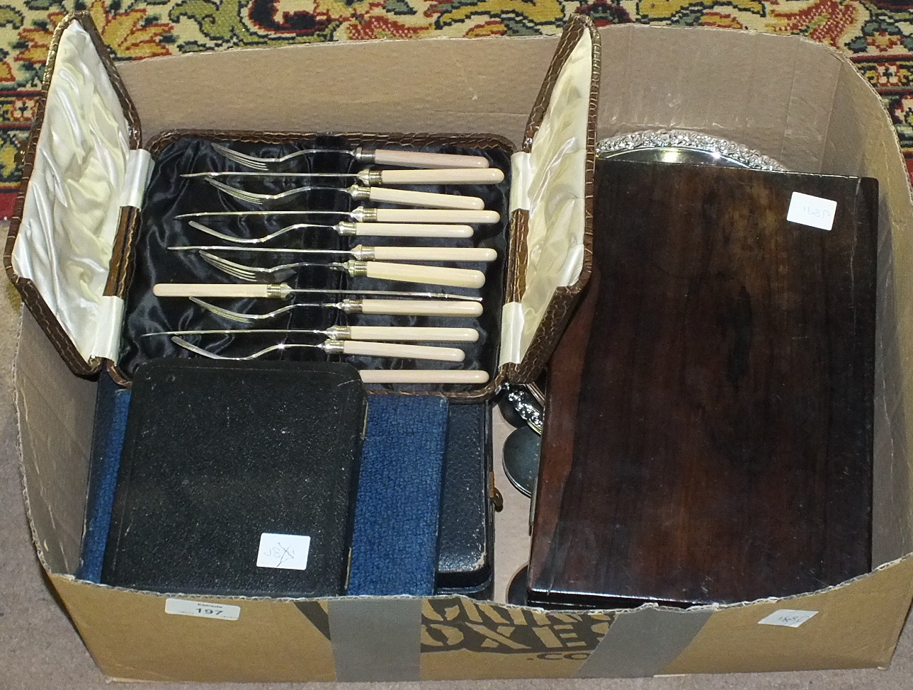 A collection of loose and boxed plated cutlery, a rosewood box (a/f) and a small quantity of hand