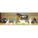 A Beswick 'Mare and Foal' on base, 2nd version, (small chip to mare's ear), a Poole dolphin, a