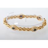 Armband GG 18 K mit 5 oval fac. Safiren ca. 2,5 cts und 60 Brill. zus. ca. 1,42 cts TW-W/vsi-si.