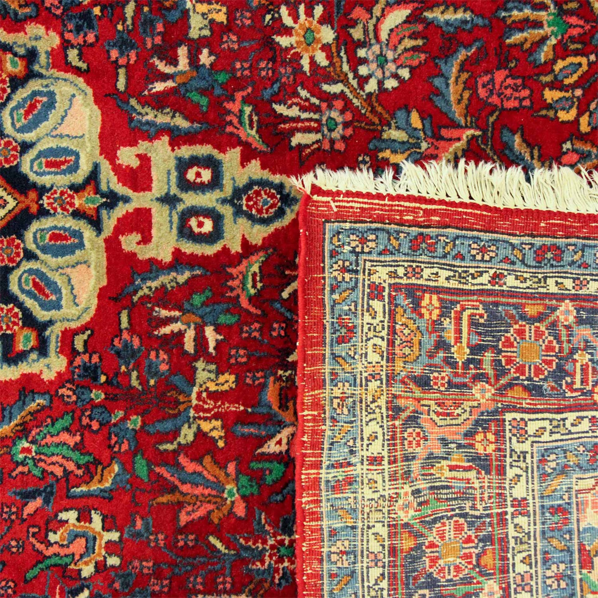 Orientteppich. SANDJAN/IRAN, 20. Jh., ca. 202x130 cm ein sternförmiges Zentralmedaillon mit - Bild 2 aus 2
