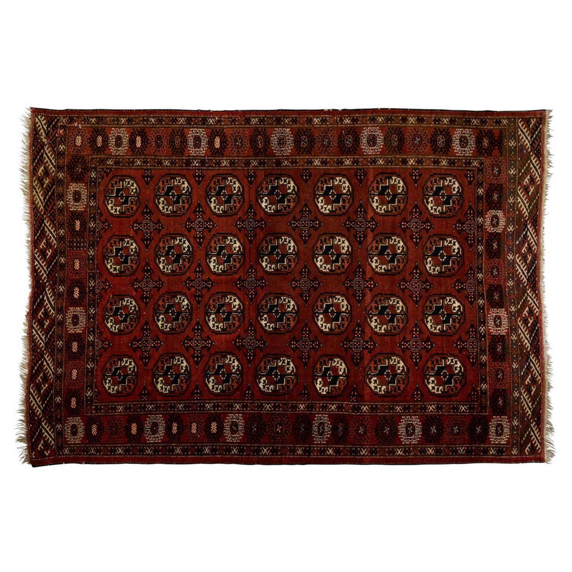 Orientteppich. TURKMENISTAN, 20. Jh., ca. 198x147 cm 4 Reihen von je 7 Göls mit dazwischen