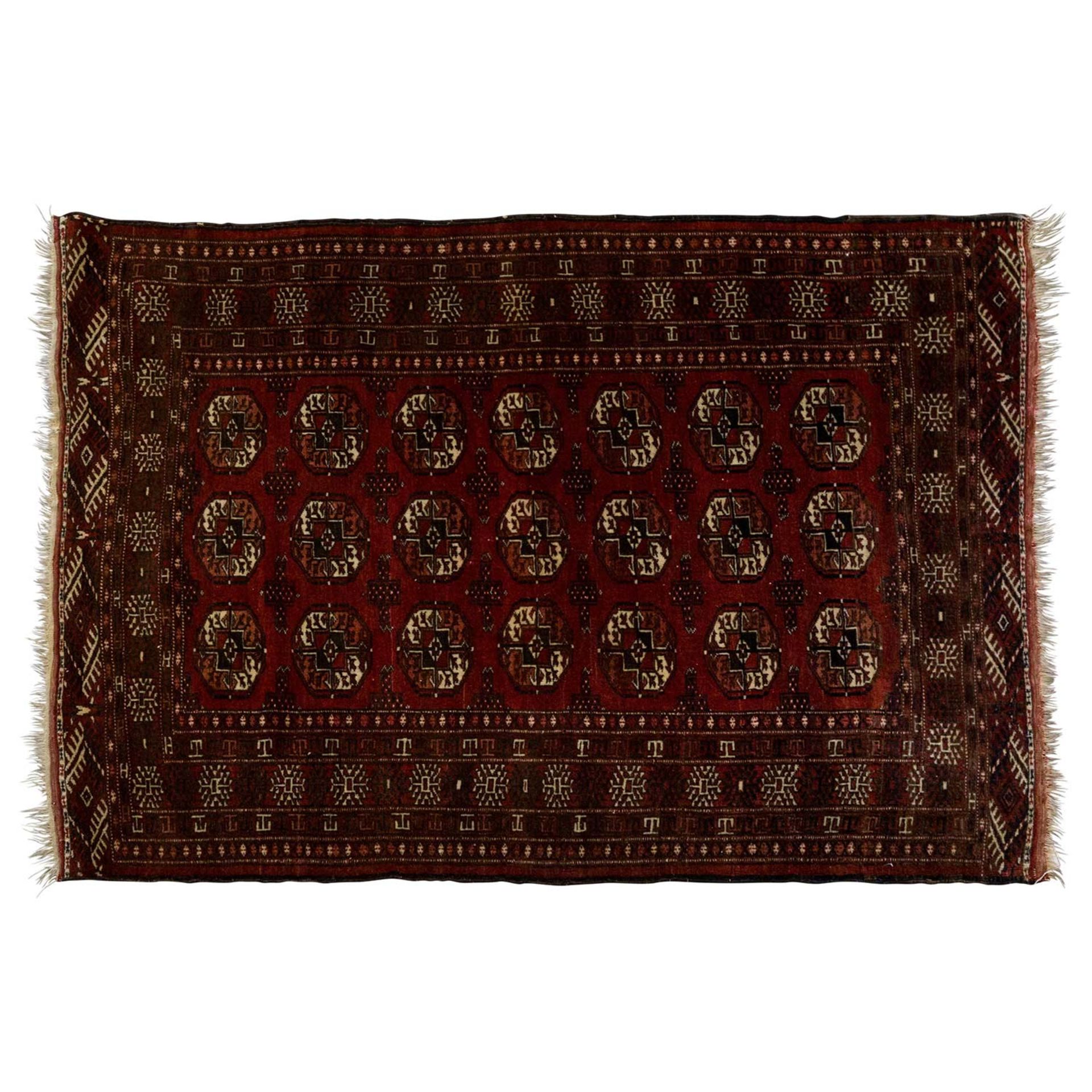 Orientteppich. TURKMENISTAN, 20. Jh., ca. 153x116 cm 3 Reihen von jeweils 7 Göls mit dazwischen