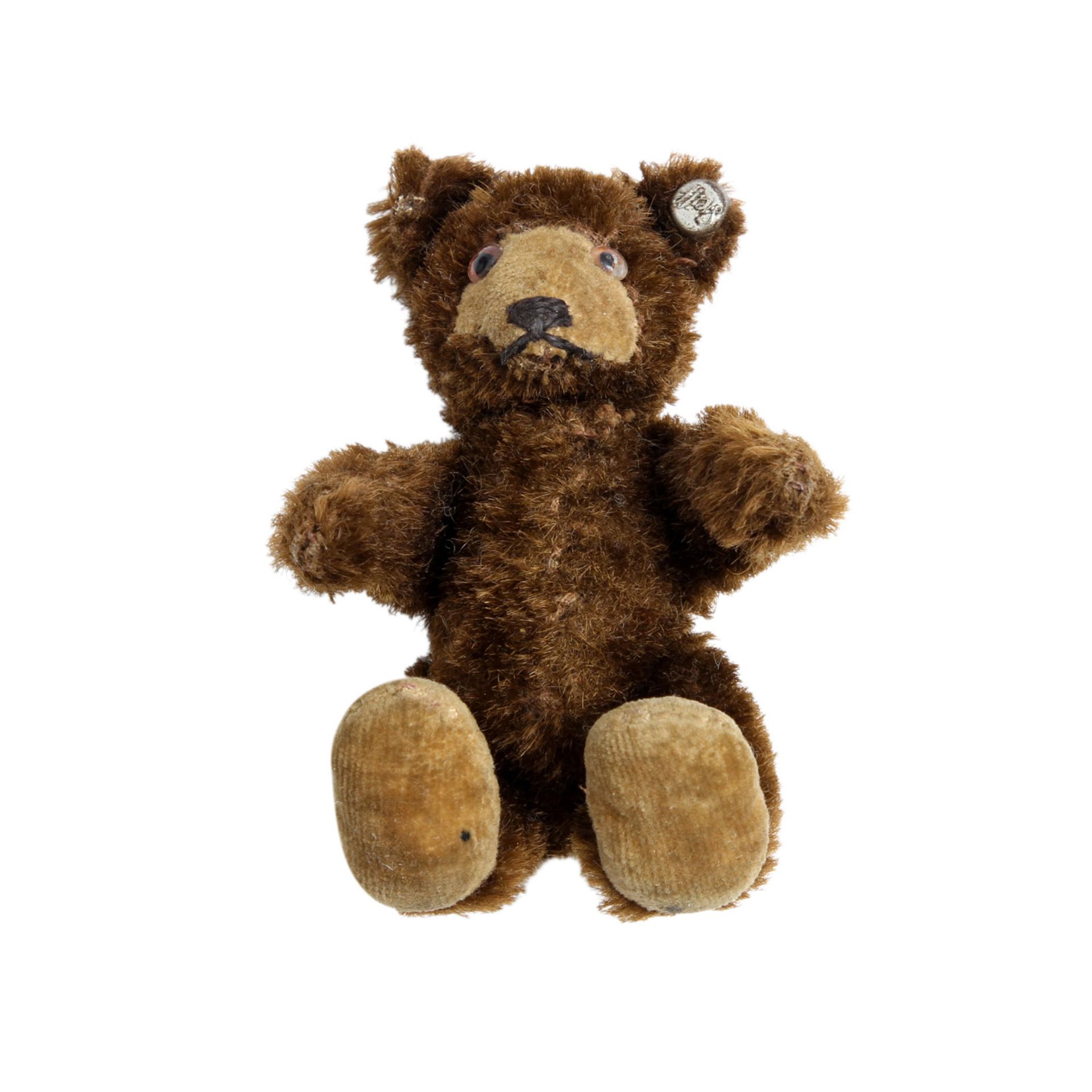 STEIFF Teddy Baby 7309, 1949-1957, Knopf, dunkelbrauner Mohairplüsch, Samtschnauze u. -füße,