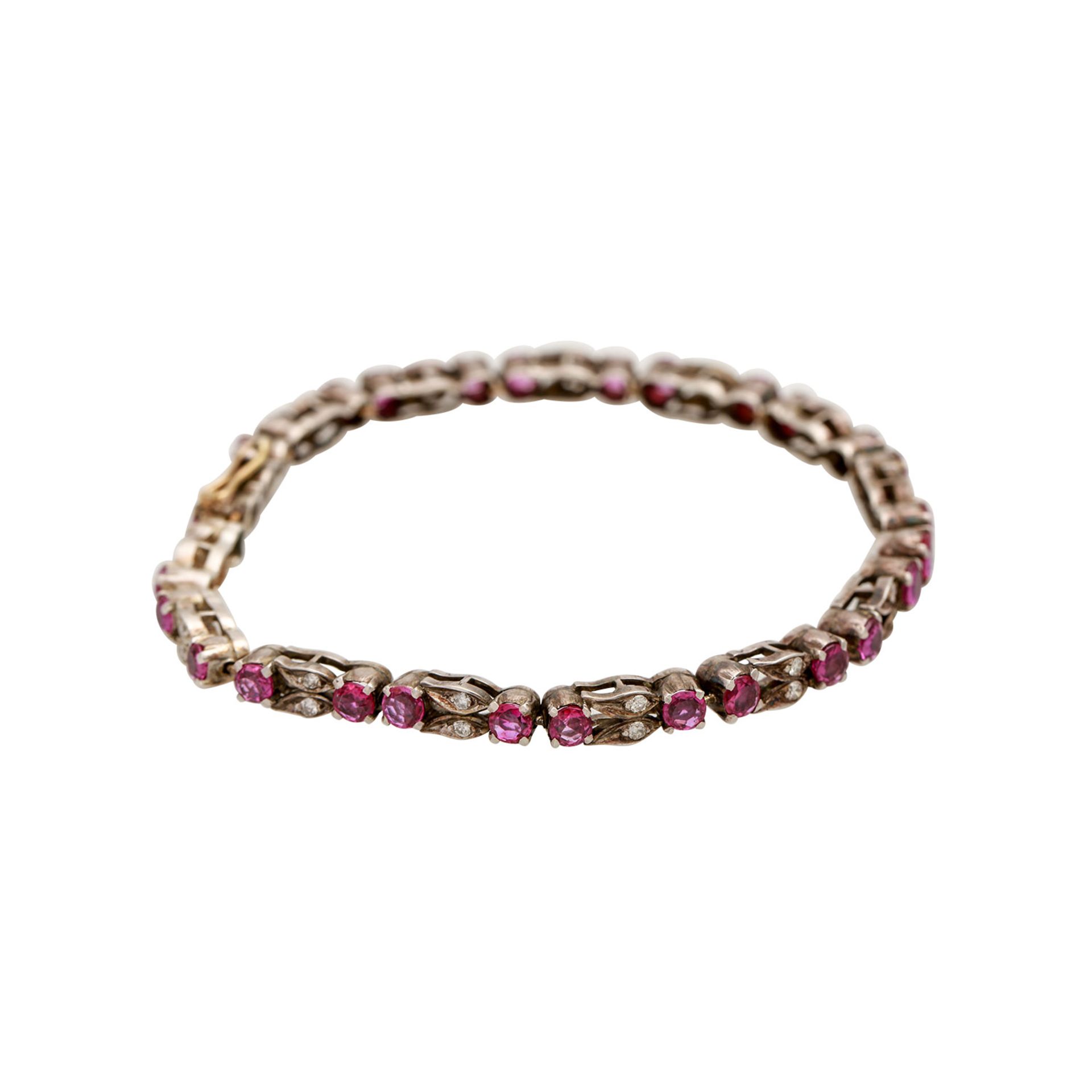 Silberarmband mit Rubinen und Diamanten, 29 Rubine, 28 Brillanten von zus. ca. 0,28 ct von mittlerer