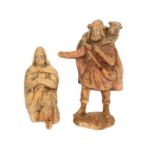 Zwei Krippenfiguren, 18. Jh.,wohl Pappmaché, bestehend aus Josef u. Hirte m. Schaf auf d. Schultern.