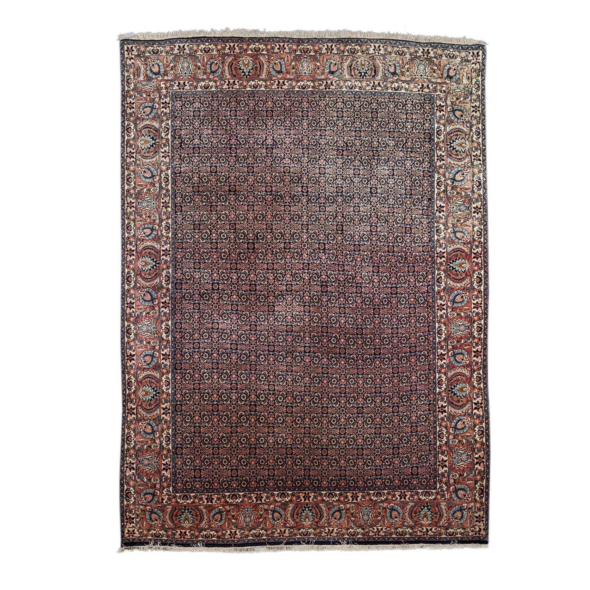 Orientteppich. BIDJAR/IRAN, 20. Jh., ca. 297x210 cm.Der dunkelblaugrundige Fond des Innenfeldes wird