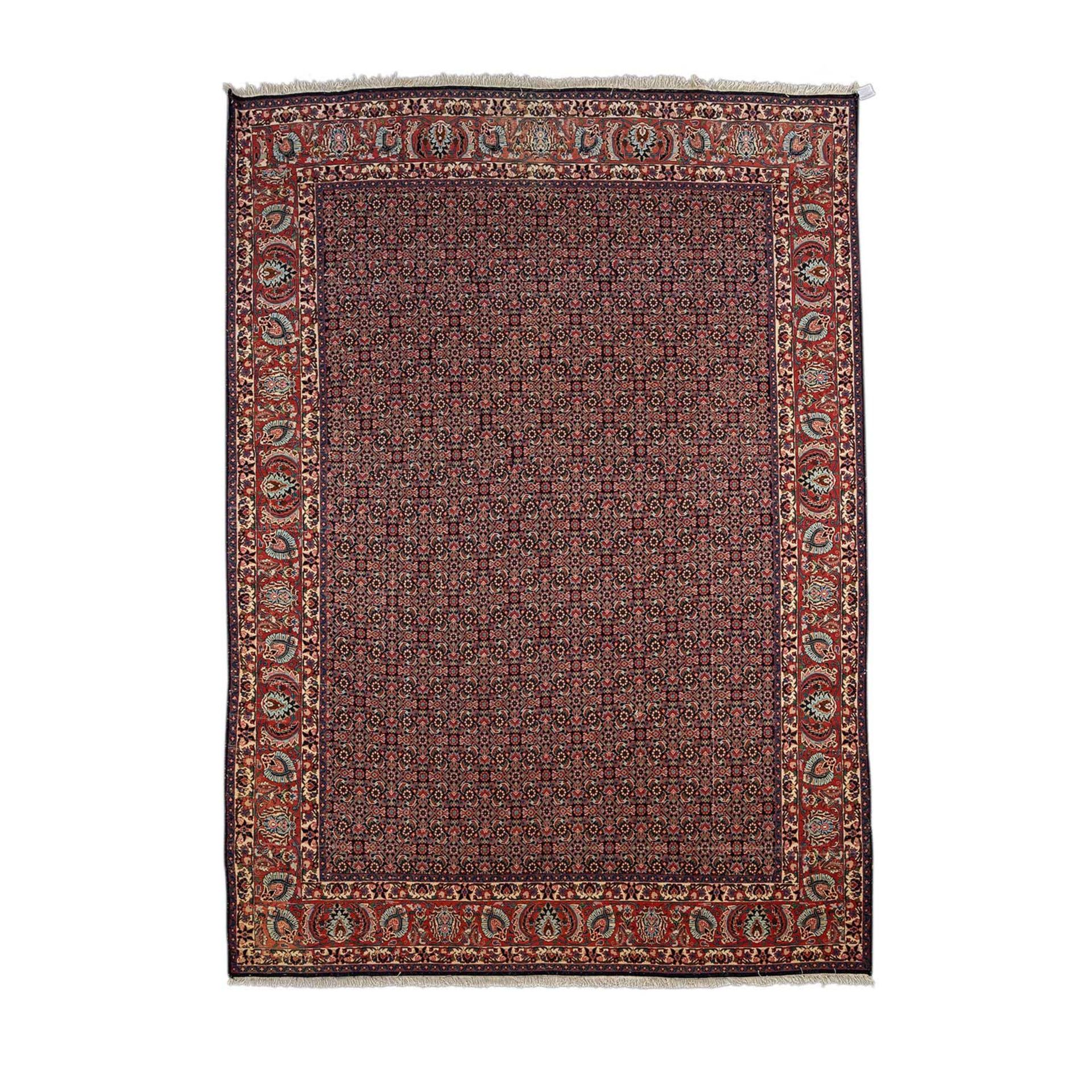 Orientteppich. BIDJAR/IRAN, 20. Jh., ca. 297x210 cm.Der dunkelblaugrundige Fond des Innenfeldes wird - Image 2 of 4